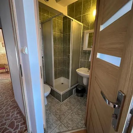 Quarto em Acomodações Particulares Wynajem Pokoi Kryniczanka Krynica Morska